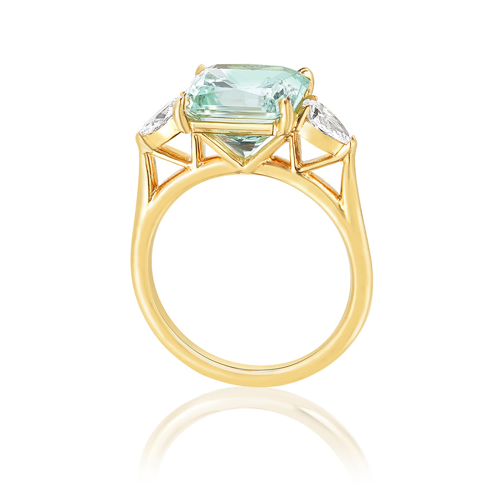 Three Stone Pale Blue, Princess Cut Tourmaline Ring with Pear Shape Diamond Side Stones set in 18K Yellow Gold October's Birthstone | Marisa Perry by Douglas Elliott