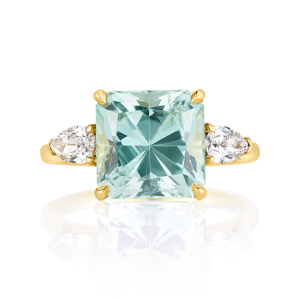 Three Stone Pale Blue, Princess Cut Tourmaline Ring with Pear Shape Diamond Side Stones set in 18K Yellow Gold October's Birthstone | Marisa Perry by Douglas Elliott