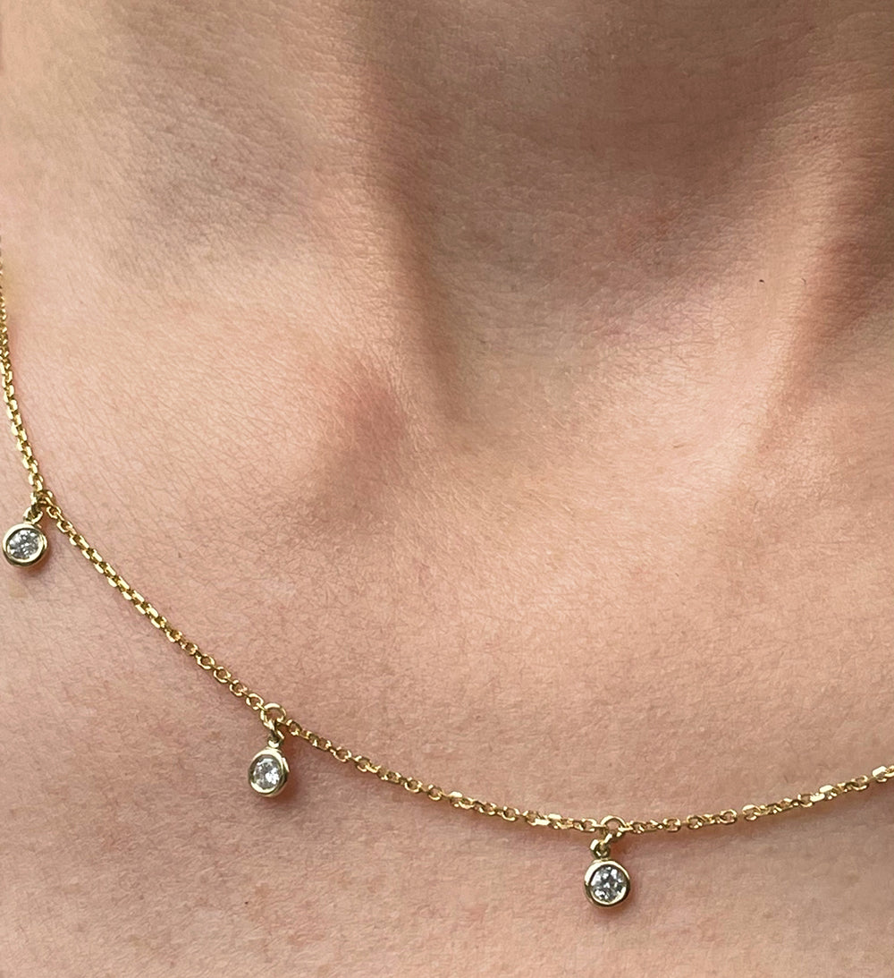 0.25 Carat Yellow  Gold and Diamond Station Necklace with Dangling Bezel Set Round Brilliant Cut Diamonds