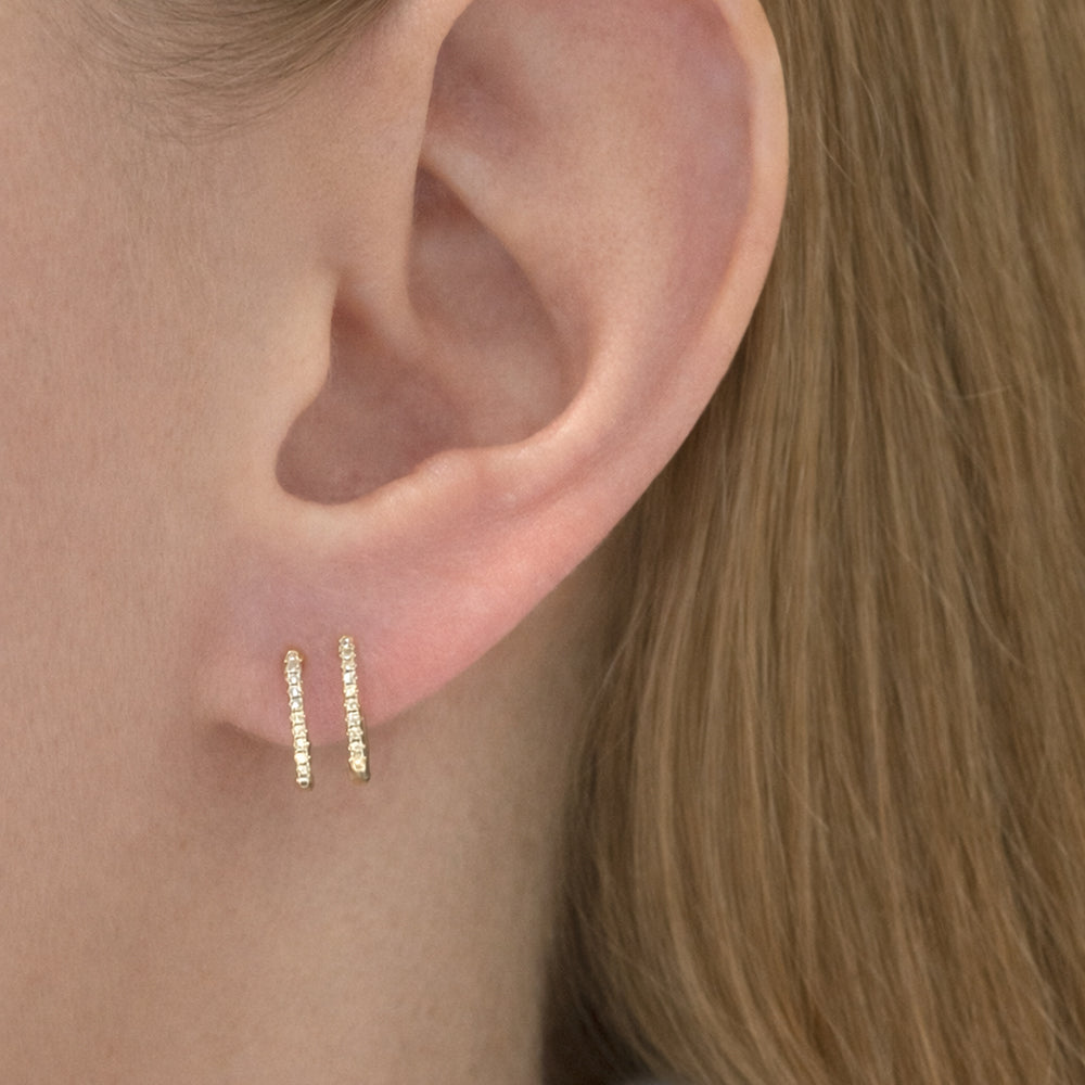Gold Hoop Earrings on an ear