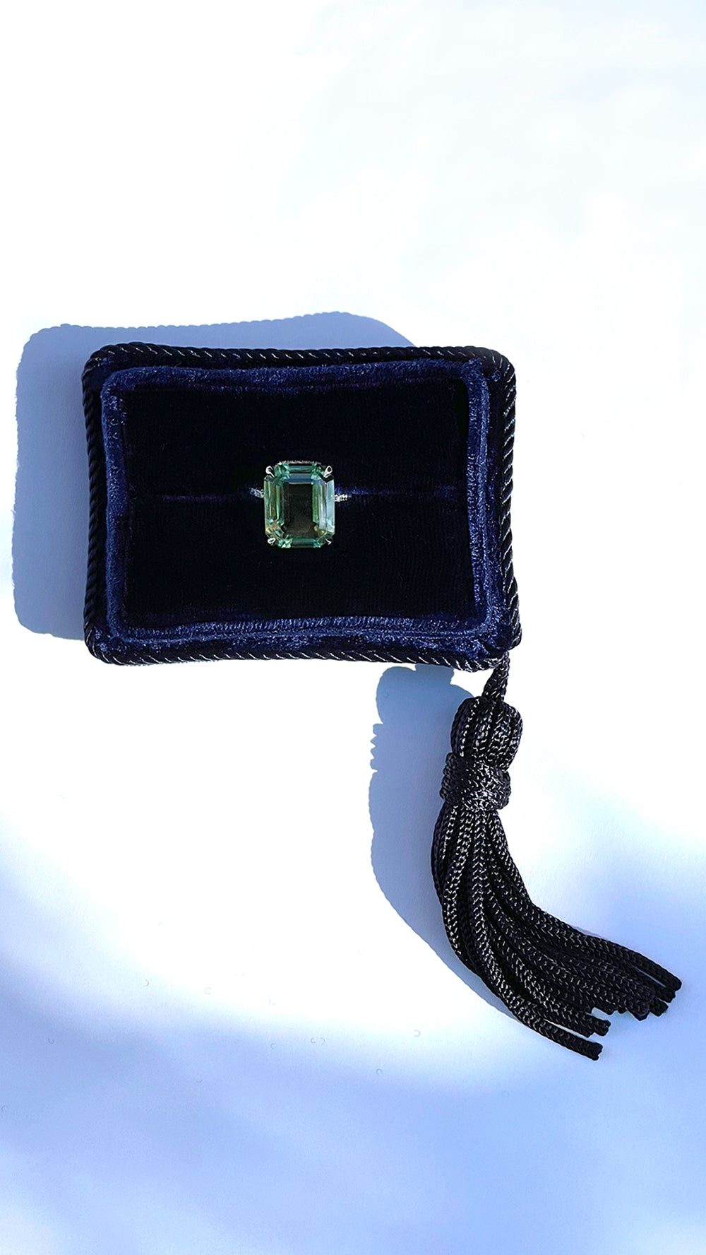 Emerald Cut Green Tourmaline Ring with a Platinum and Diamond Micro Pave Setting