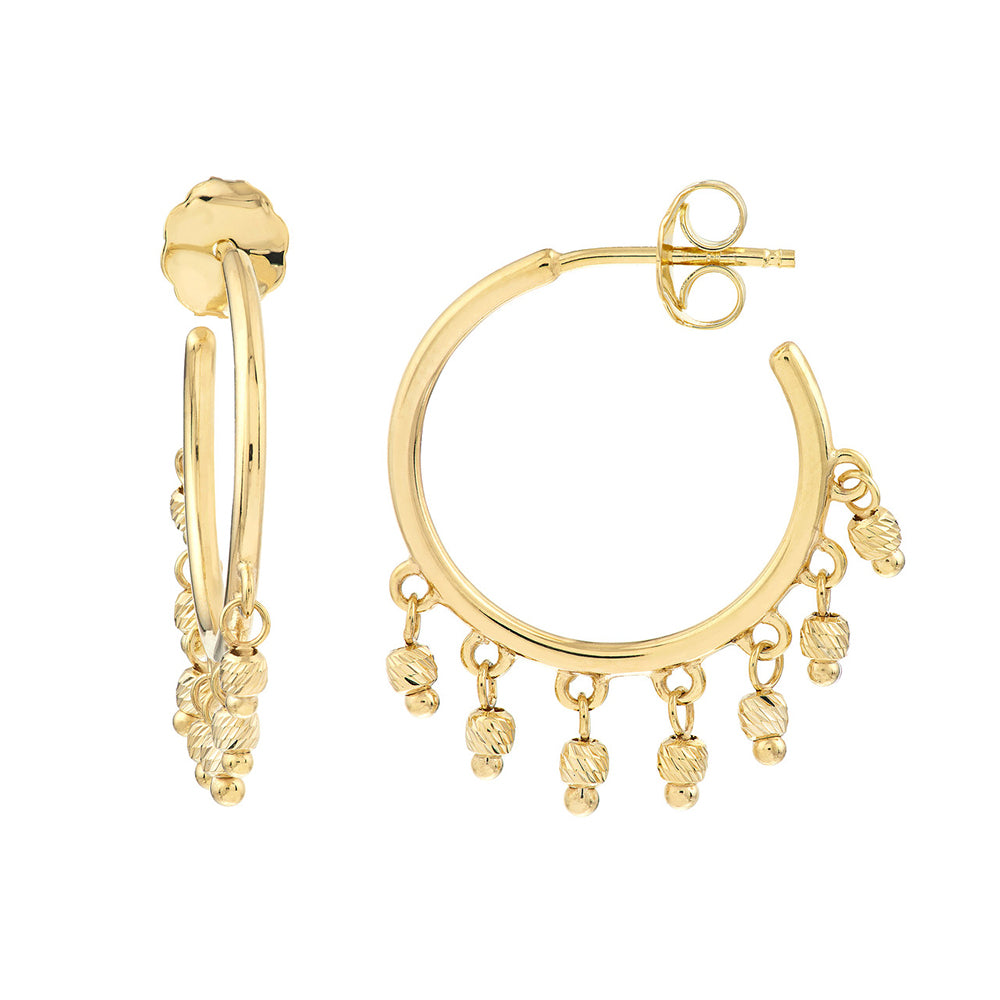 A pair of 14k yellow gold open hoop beaded earrings with dangling 2mm beads.