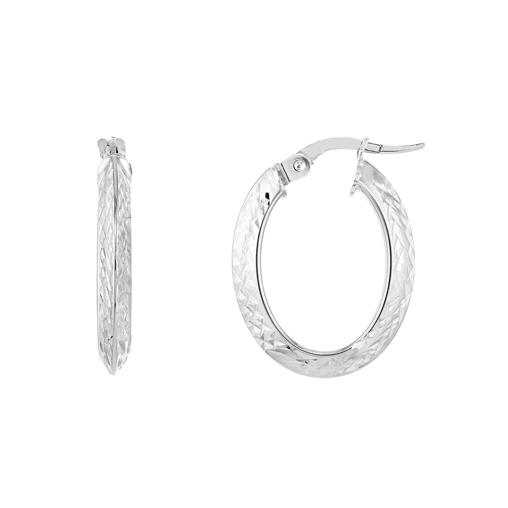 A pair of 14k white gold oval knife edge crystal DC tube earrings.