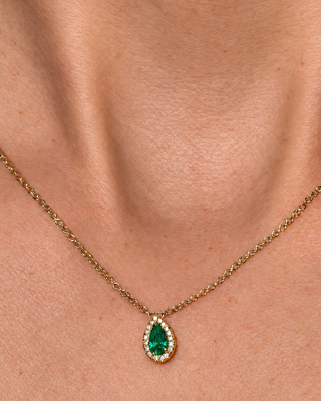 Pear Shape Emerald Pendant with a Diamond Halo 18k Yellow Gold