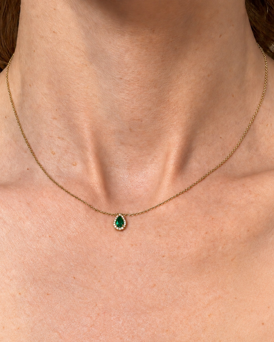 Pear Shape Emerald Pendant with a Diamond Halo 18k Yellow Gold