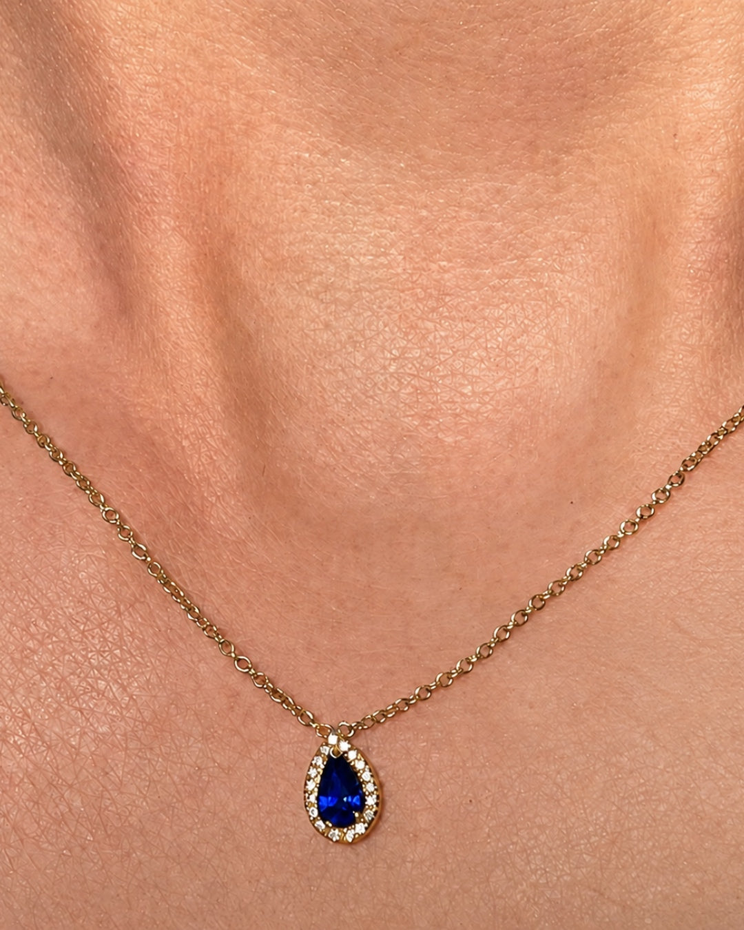 Pear Shape Sapphire Pendant with a Diamond Halo 18k Yellow Gold