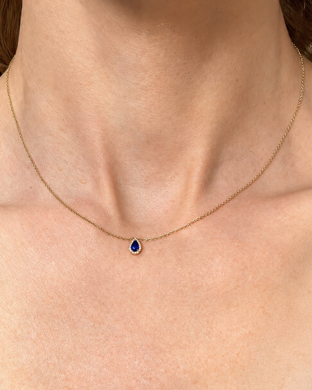 Pear Shape Sapphire Pendant with a Diamond Halo 18k Yellow Gold
