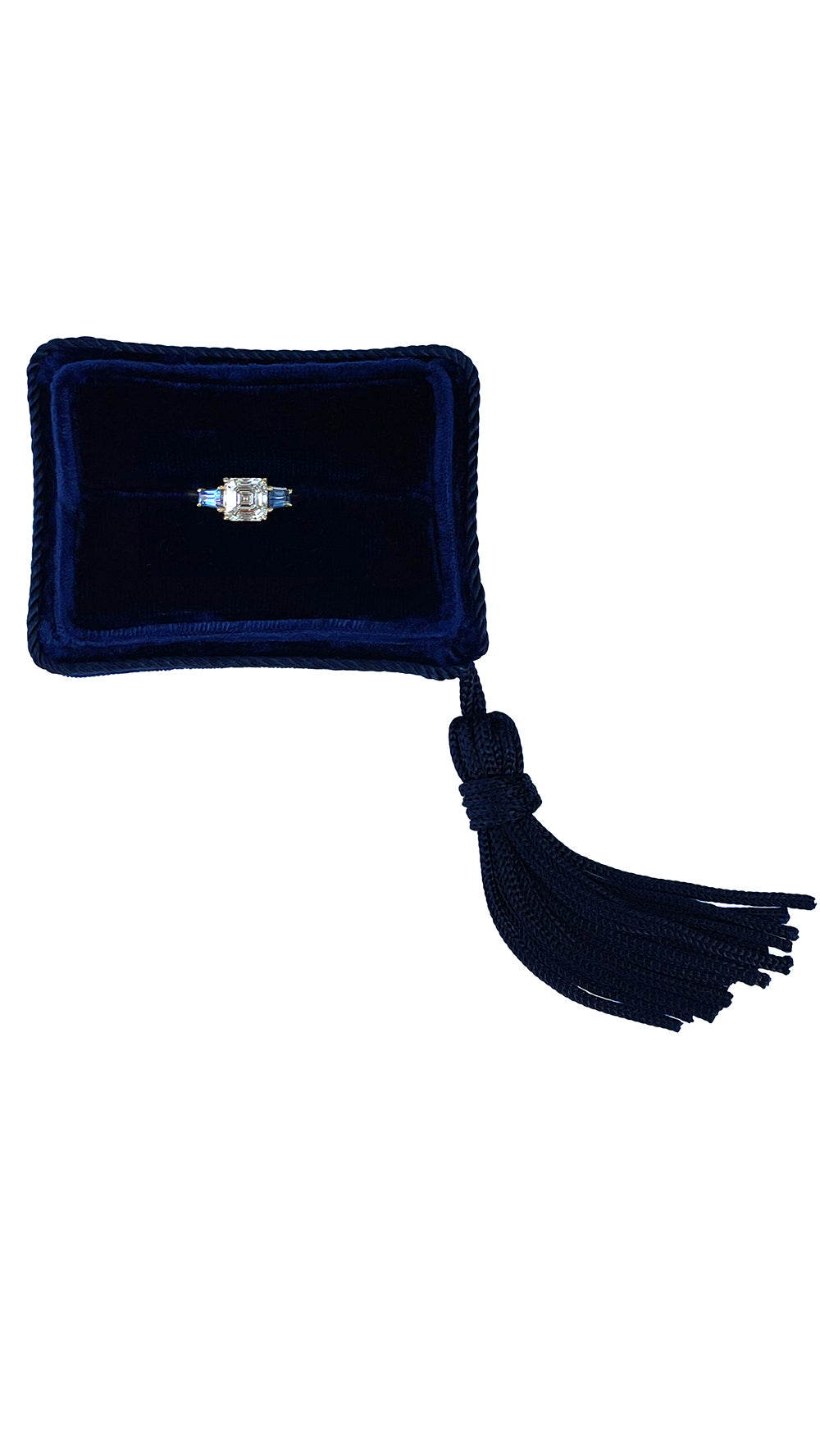 The Asscher Cut Three Stone Ring with Blue Sapphire Tapered Baguettes