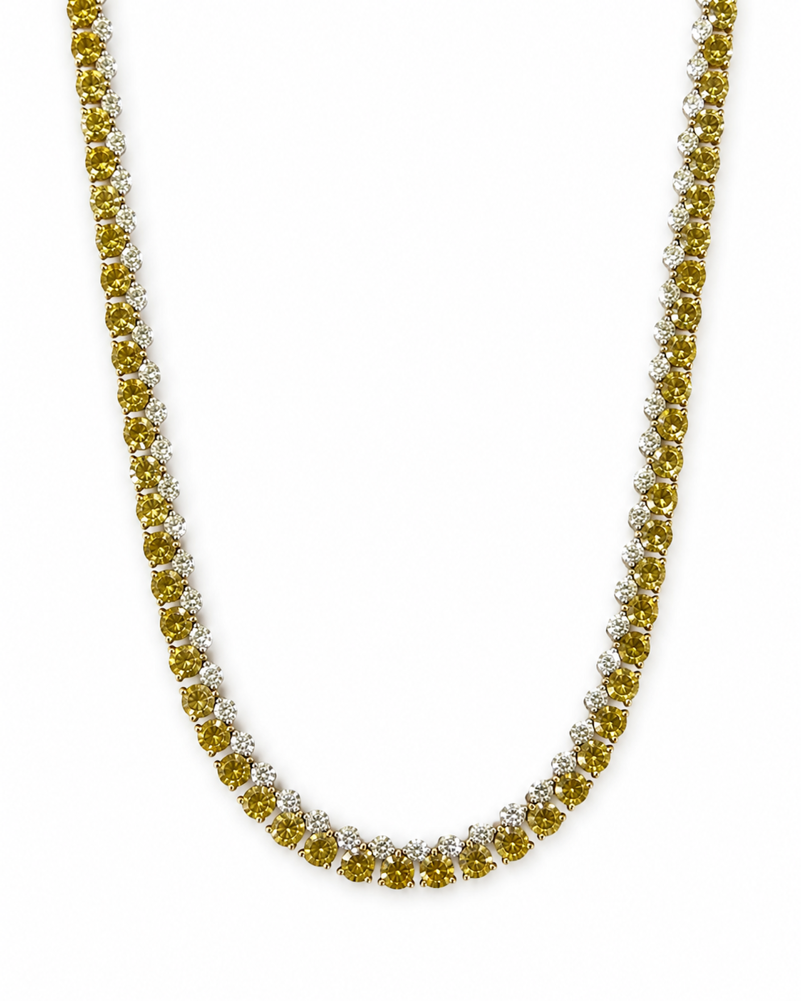 Alternating white and yellow diamond tennis necklace featuring natural round brilliant diamonds set in 18K white and yellow gold.