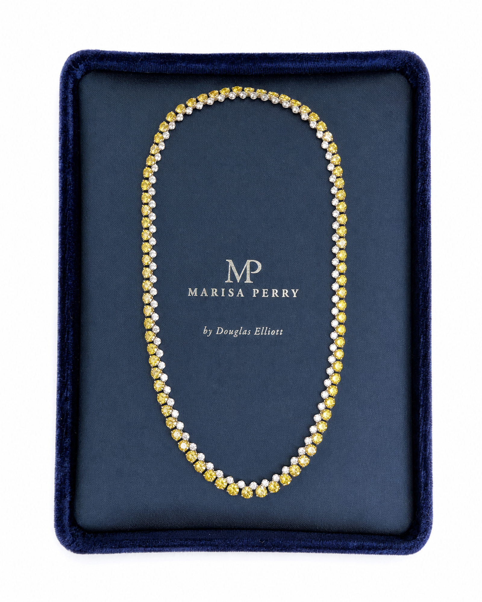 Alternating white and yellow diamond tennis necklace featuring natural round brilliant diamonds in 18K white and yellow gold displayed in a Marisa Perry jewelry box.