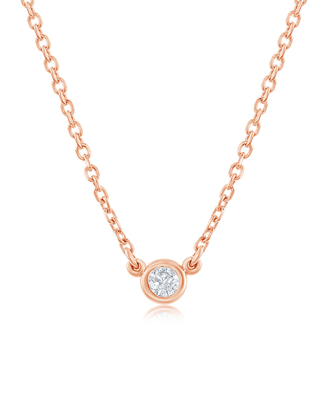 Bezel Set Diamond Solitaire Pendant Necklace in 14K rose gold featuring a 0.05 carat round brilliant-cut diamond.
