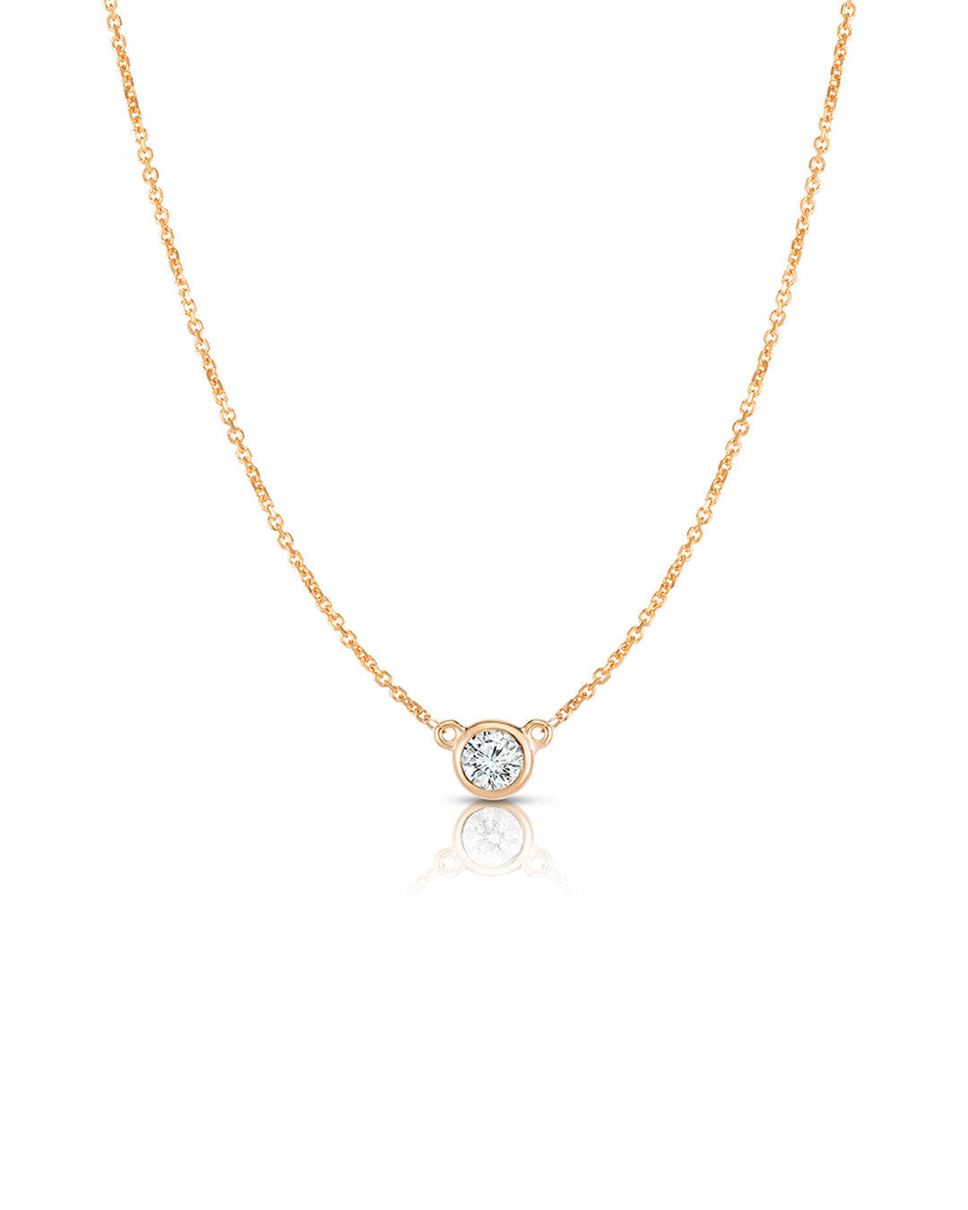 Bezel Set Diamond Solitaire Pendant Necklace in 14K rose gold featuring a 0.25 carat round brilliant-cut diamond.