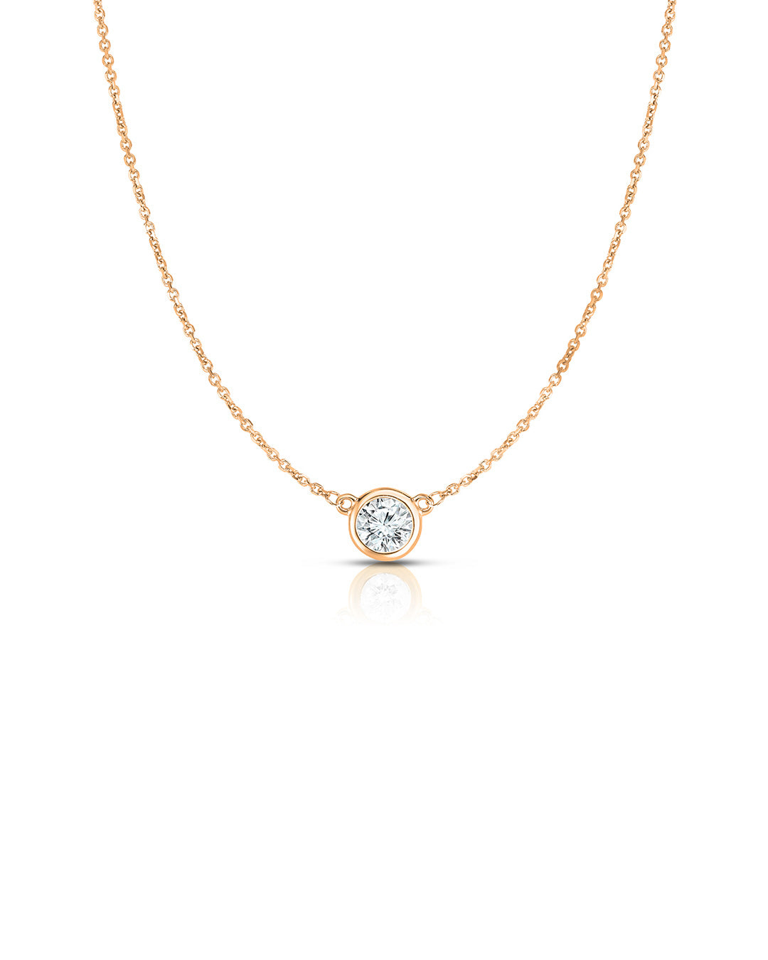 Bezel Set Diamond Solitaire Pendant Necklace in 14k rose gold featuring a 0.75 carat round brilliant-cut diamond.