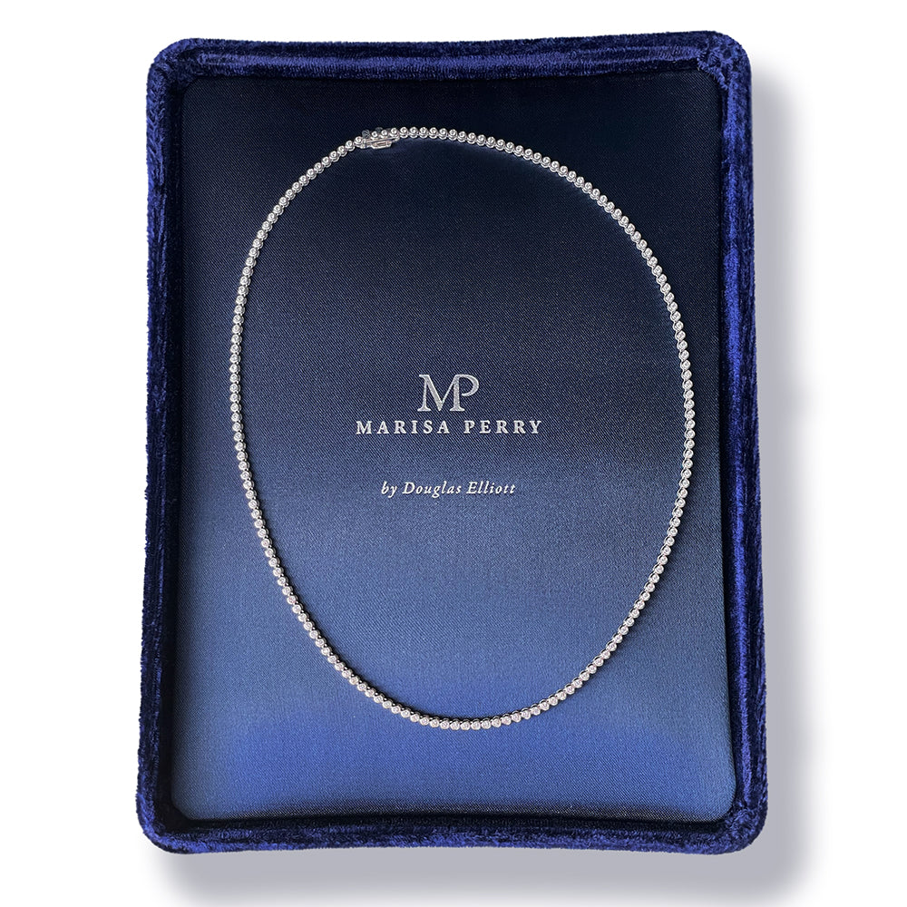 Bezel Set Diamond Tennis Necklace - 1.88 TCW displayed in a navy Marisa Perry jewelry box.