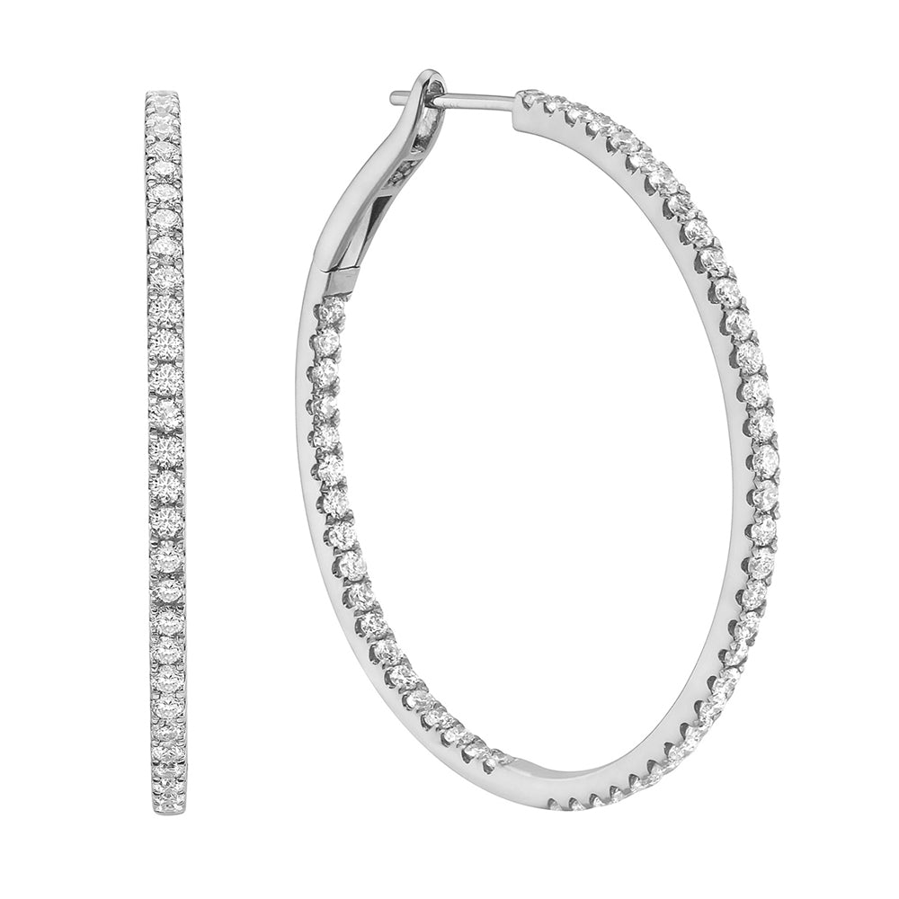 Express Yourself diamond hoop earring crafted in 14K white gold with round brilliant diamonds.