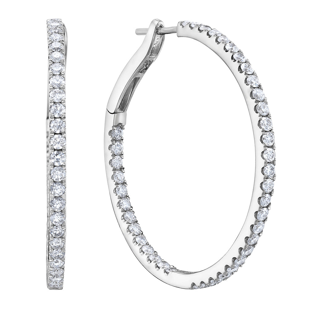 Harmony diamond hoop earring in 14K white gold featuring round brilliant diamonds totaling 1.41 carats.