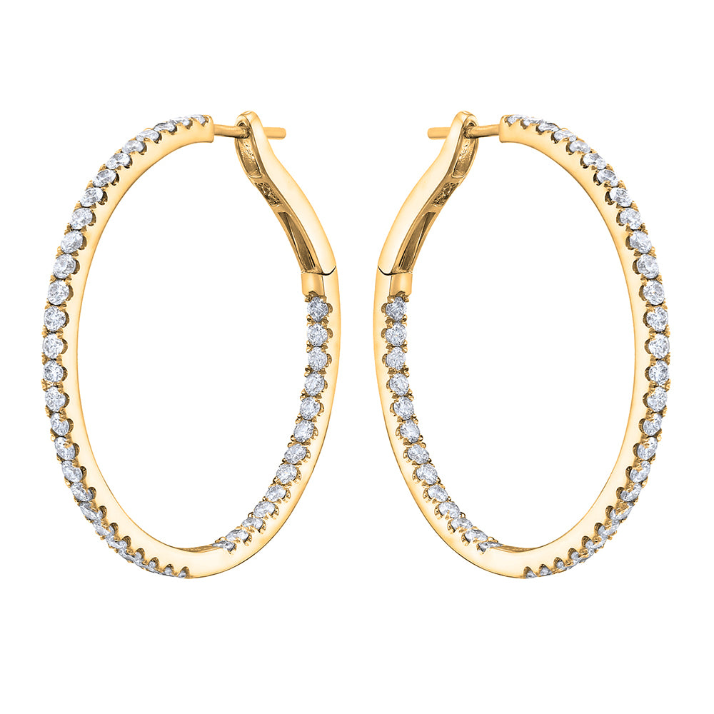 Pair of Harmony diamond hoop earrings crafted in 14K yellow gold with 84 round brilliant diamonds.