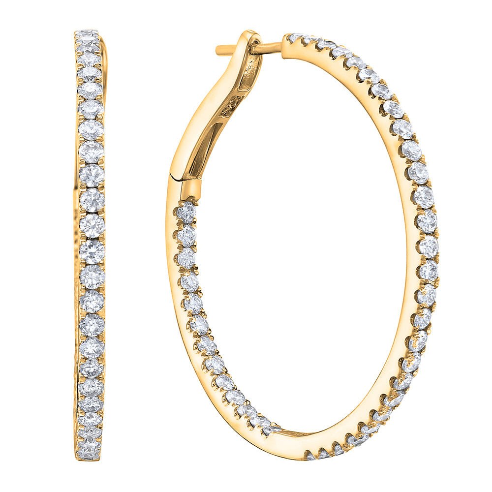 Harmony diamond hoop earring in 14K yellow gold featuring round brilliant diamonds totaling 1.41 carats.