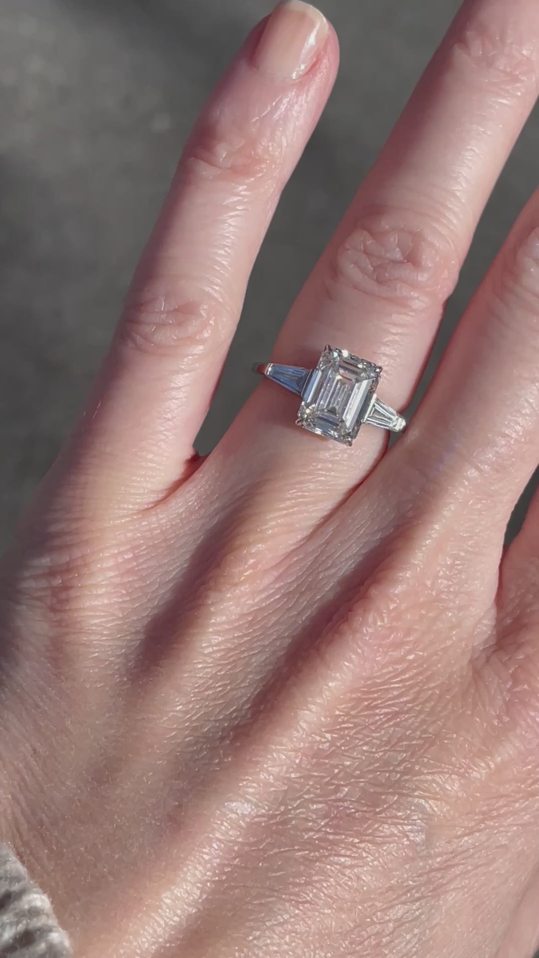 3.53 Carat Emerald Cut Diamond Three Stone Engagement Ring with Tapered Baguettes | Marisa Perry by Douglas Elliott_A26176_Video