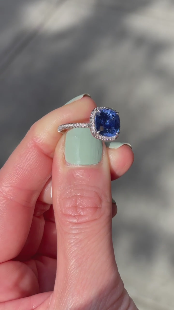 Sapphire_and_Diamond_Ring_with_Halo_in_a_Platinum_InLove_Setting_Marisa_Perry_by_Douglas_Elliott_G15959_Video