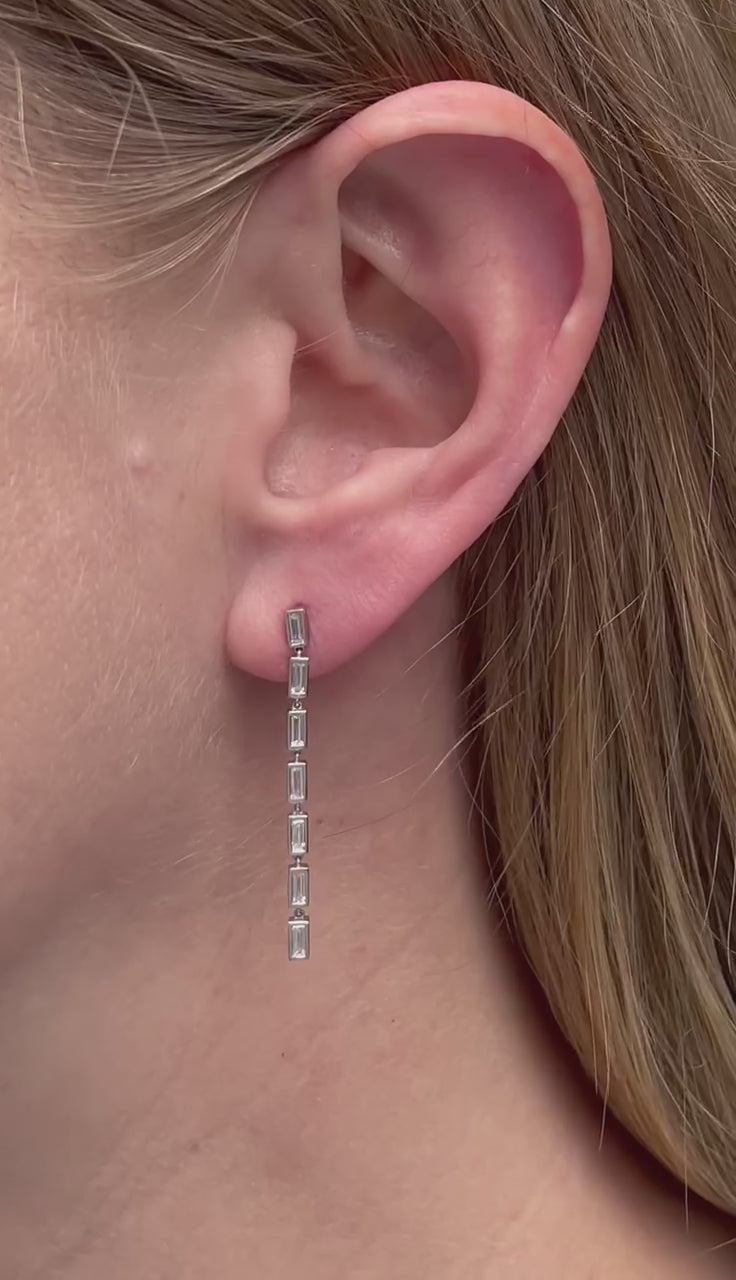 Bezel Set Baguette Diamond Dangle Drop Earrings in Platinum | Model | Closeup